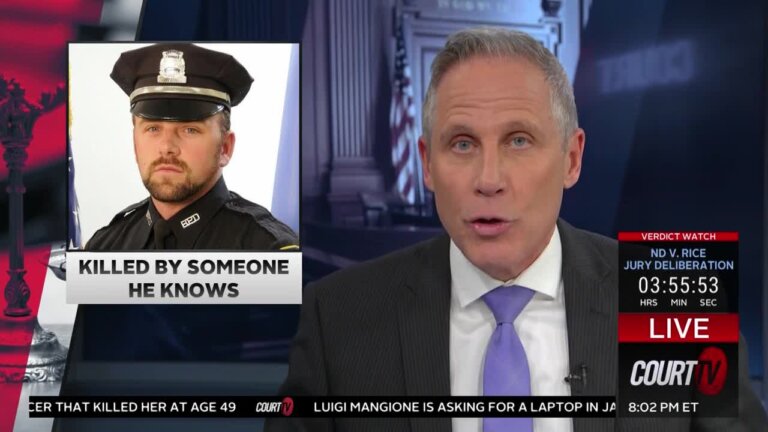 Handsome news anchor reports on the death of a police officer.